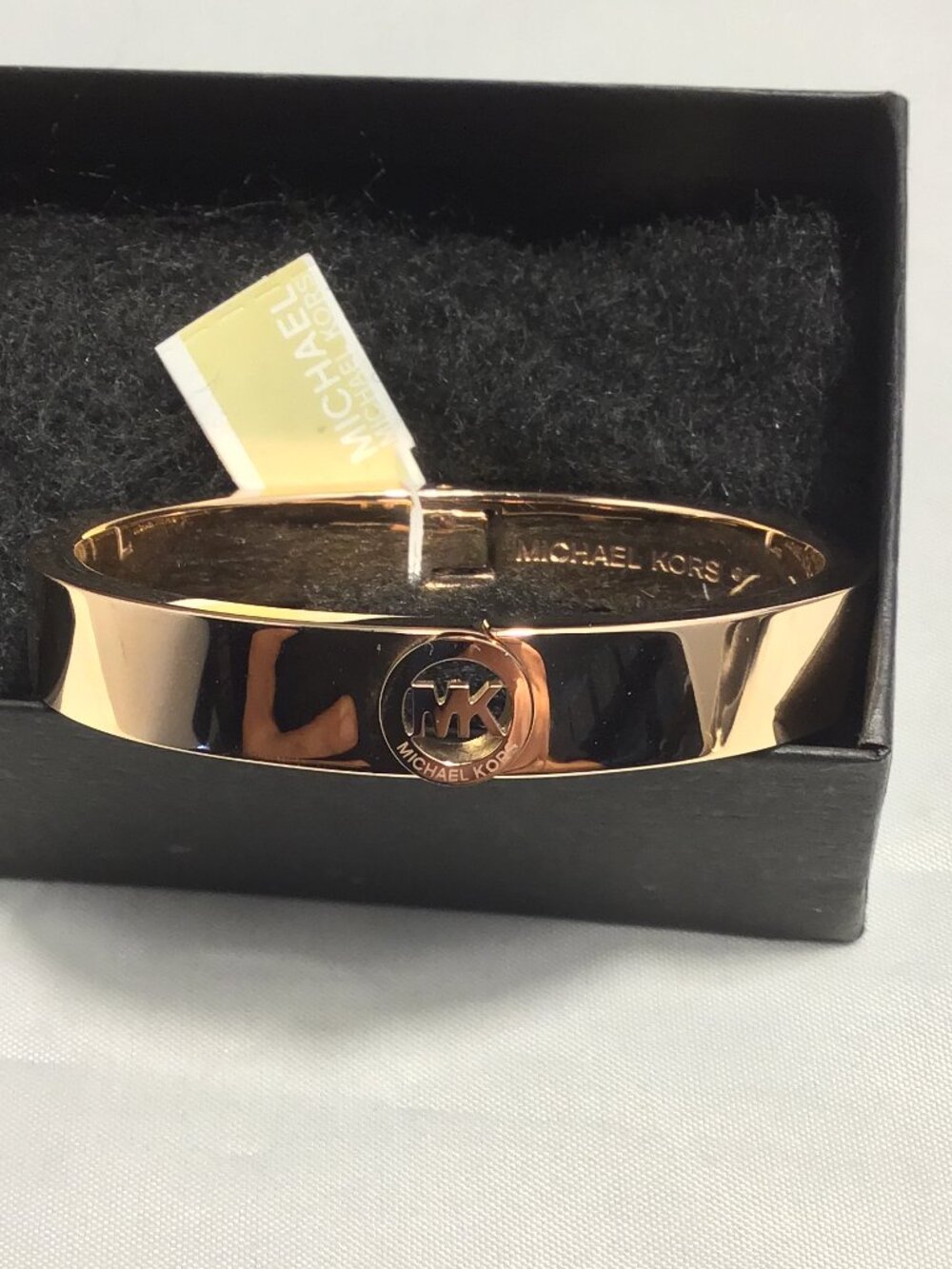 Michael Kors Logo Hinged Bangle Bracelet Golden Tone